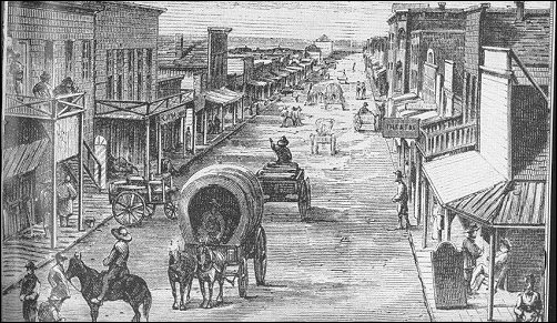 [Busy dirt street filled with people, animals, and wagons.]