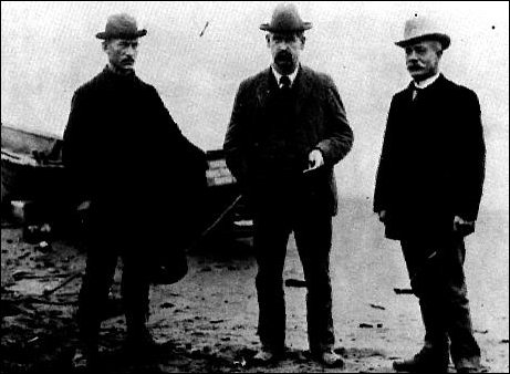 Wyatt Earp with Ed Englestadt and John Club on beach in Nome, Alaska